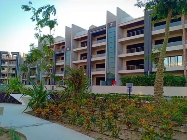 For Sale With Installment An Apartment 225m Ground Floor With Garden in Midtown New Cairo